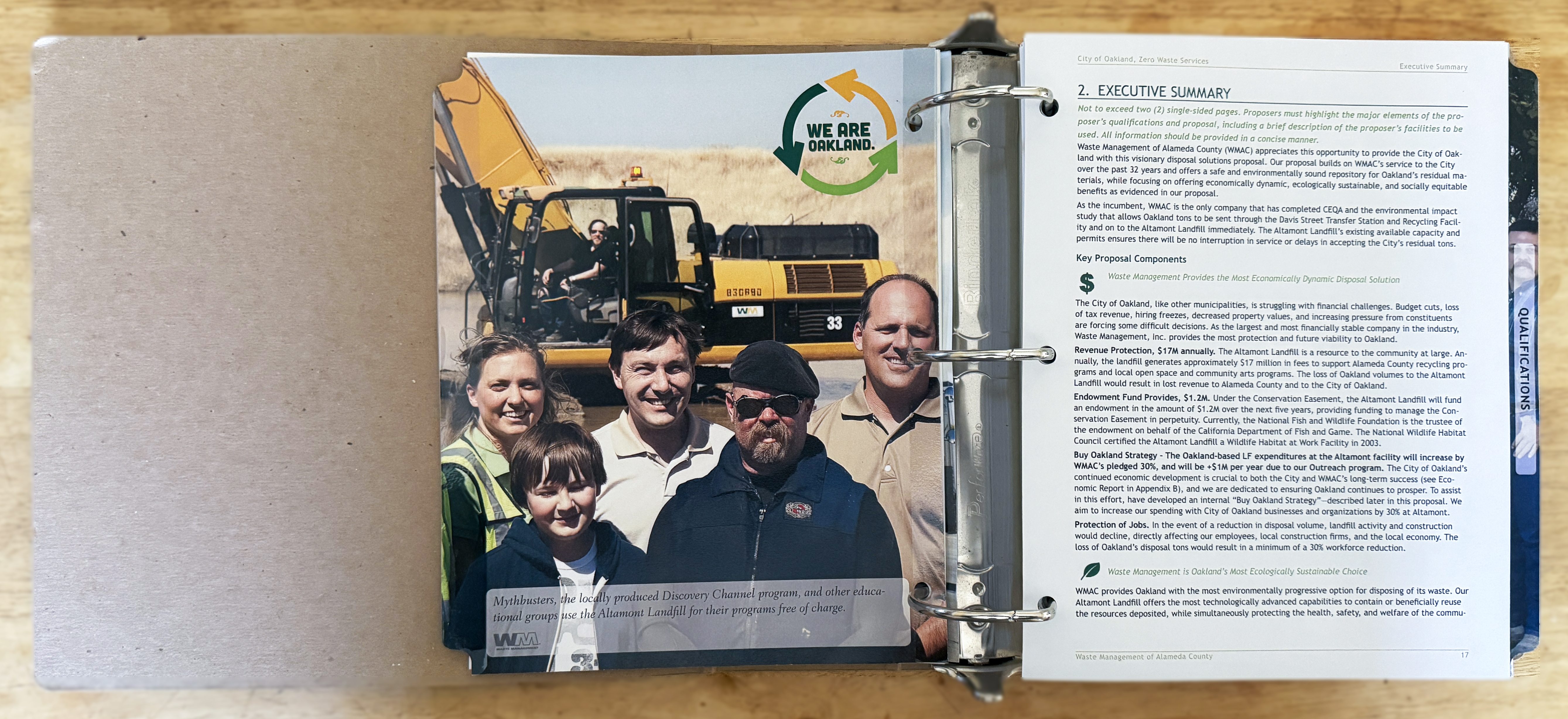 Open binder showing CNG truck tab — Think Green Think Clean