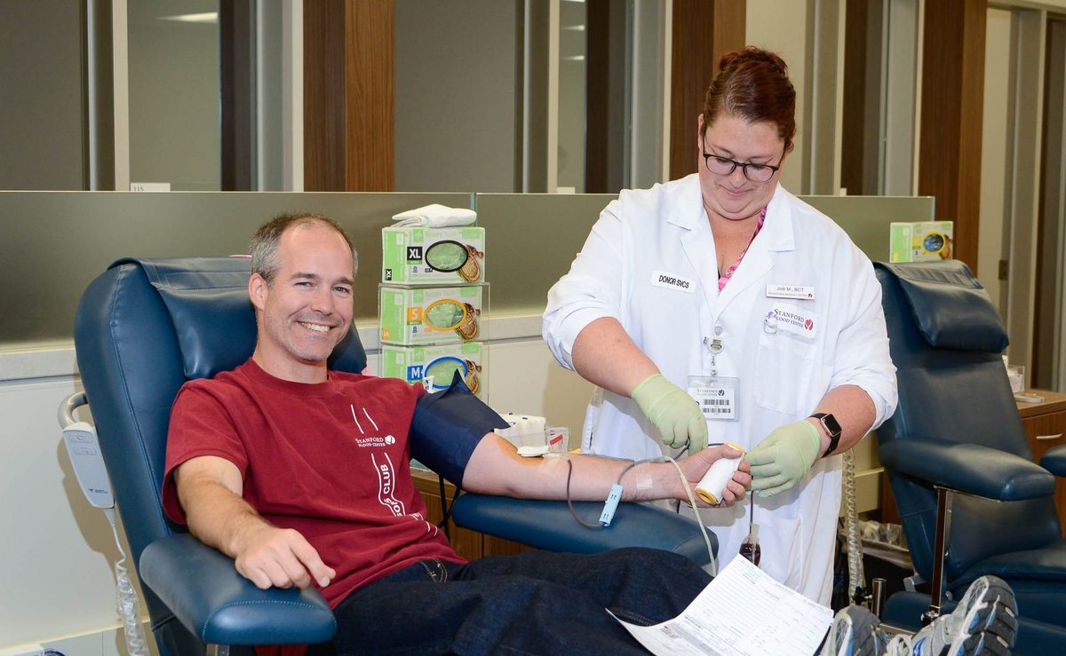 Donor being attended to at Stanford Blood Center South Bay — warm, spa-inspired donation bay